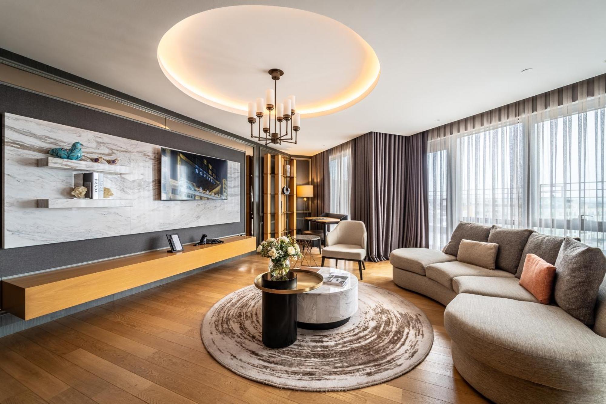 Sofitel Istanbul Taksim Hotell Eksteriør bilde A living room in a luxury apartment